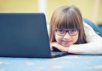 Girl with an open laptop